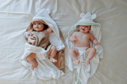 Muslin and bamboo towel with a hood