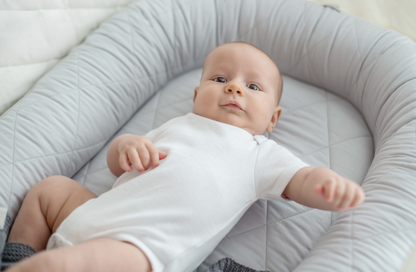 Baby nest with a solid base "Light gray"